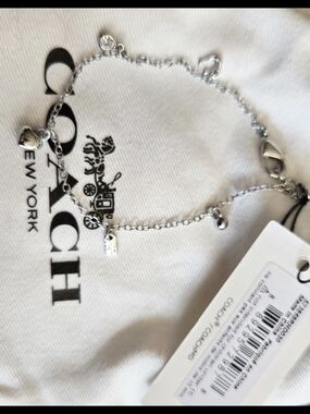 Coach Silver Charm Bracelet with Heart Accents